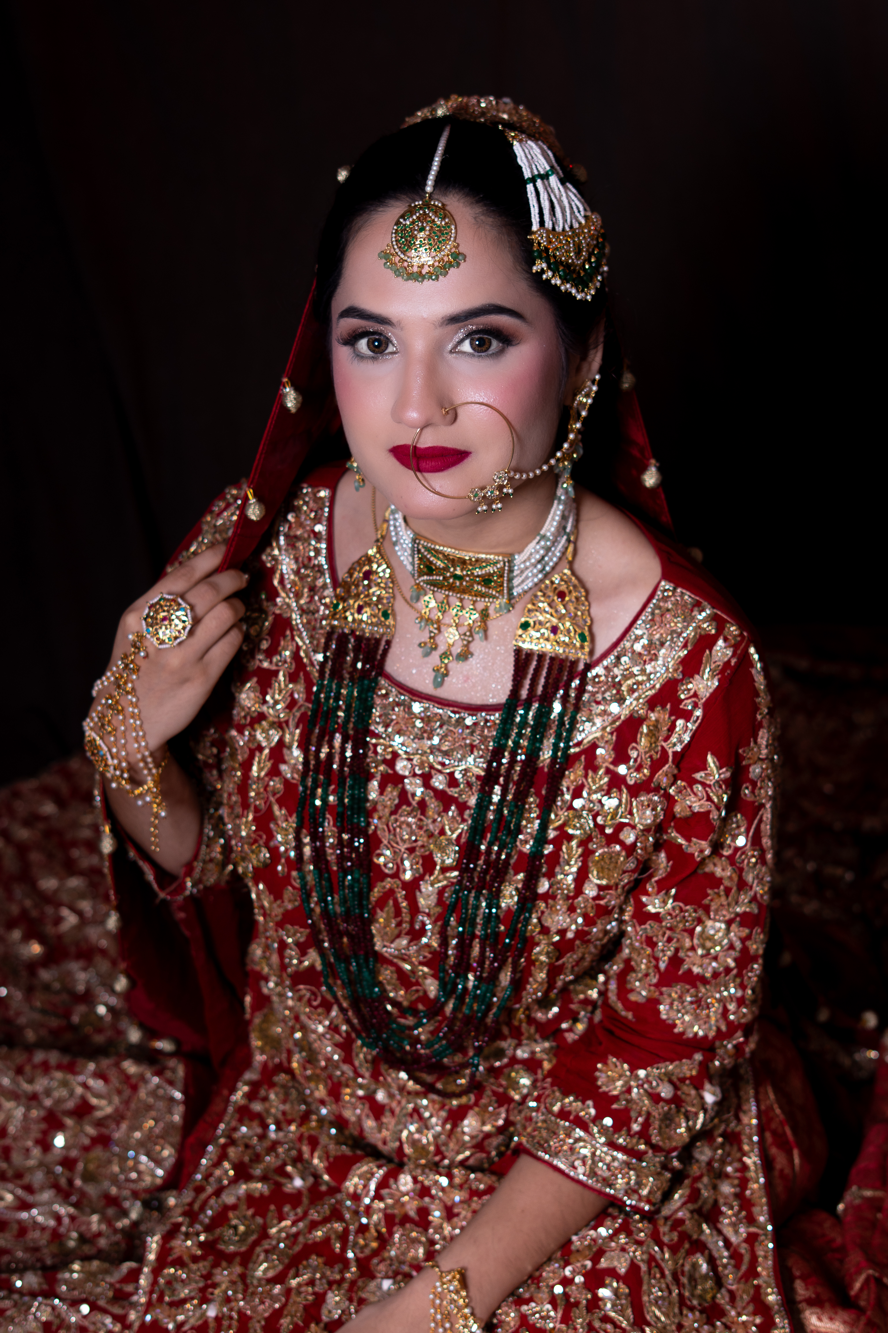 Intricate bridal eye artistry and balanced ceremonial styling by Alina Khatoon